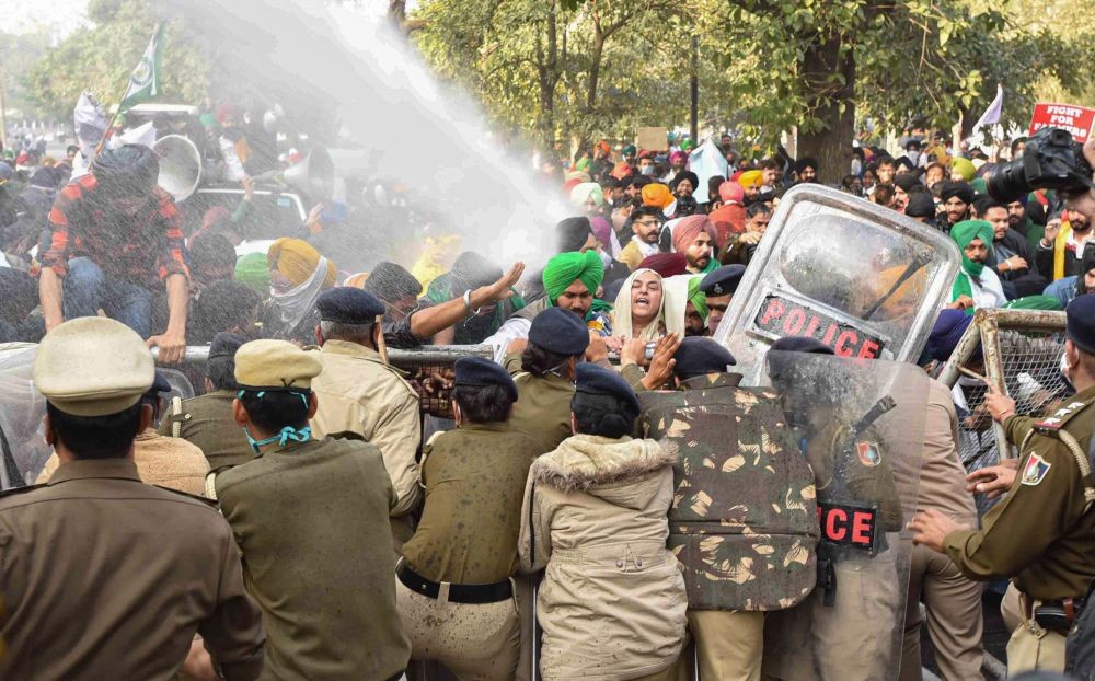Chandigarh: Police uses water cannons to stop farmers during their protest against the Center's new farm laws, in Chandigarh, Tuesday, Dec. 8, 2020.Various farmer unions today called for a nationwide strike demanding repeal of the agri laws. (PTI Photo)